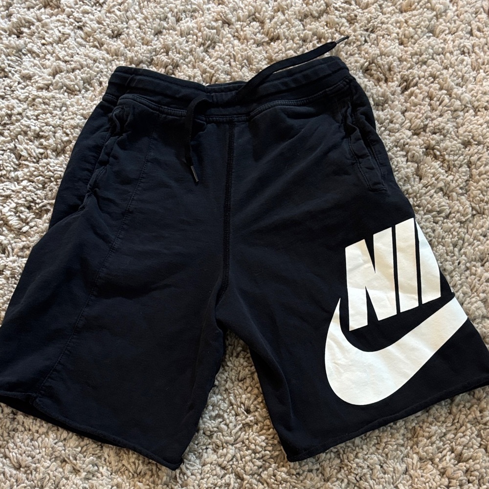 Nike Black Athletic Shorts with White Branding